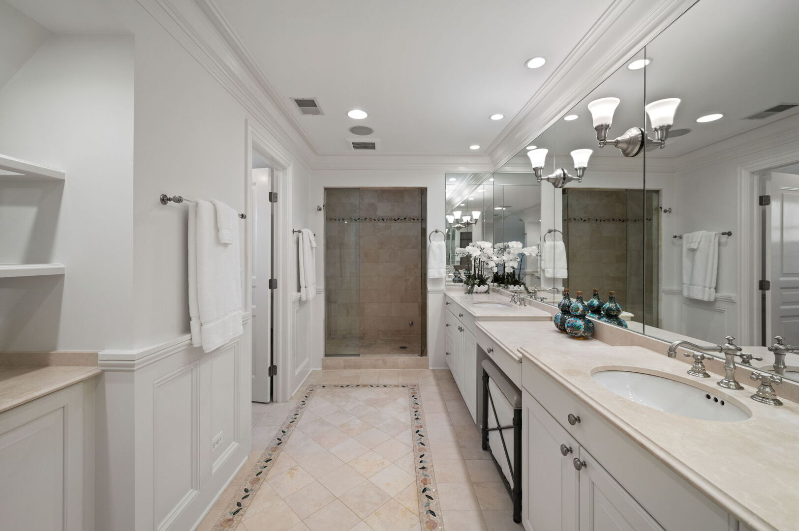 677 Greenleaf Avenue Glencoe, IL 60022 - Photo 25 of 54 a bathroom with a double vanity sink mirror and shower