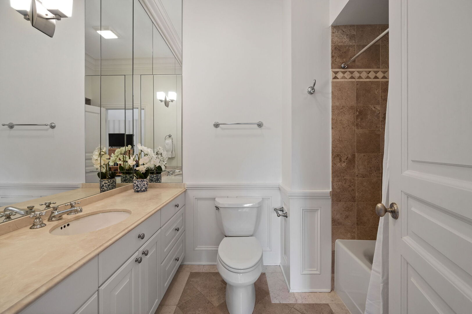 677 Greenleaf Avenue Glencoe, IL 60022 - Photo 31 of 54 a bathroom with a sink a toilet and shower