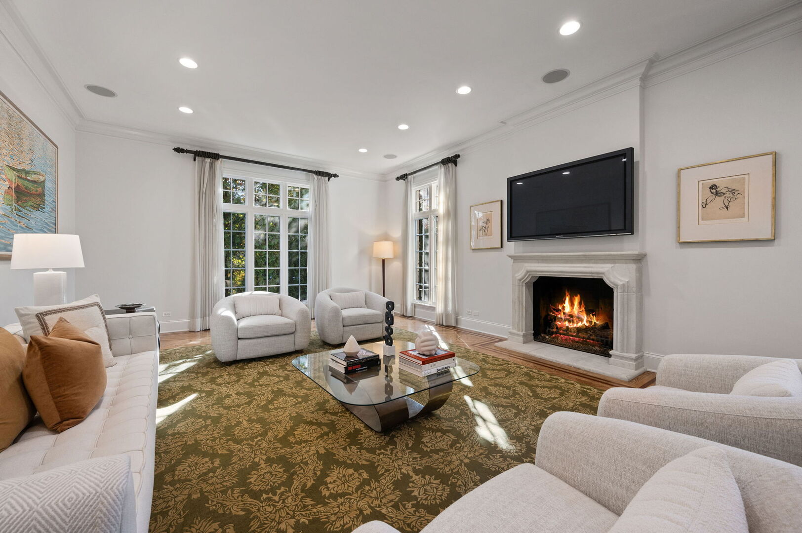 677 Greenleaf Avenue Glencoe, IL 60022 - Photo 9 of 54 a living room with furniture large window and a fireplace