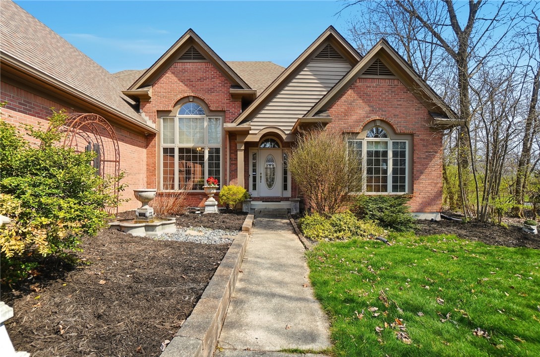 472 Timber Walk Court Springboro, OH 45066 - Photo 57 of 86 This classic brick residence features an inviting entryway and meticulously maintained landscaping.