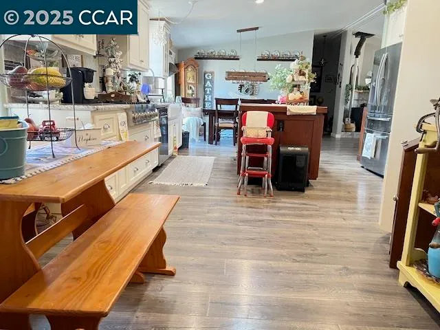 a bedroom with two beds and a dresser