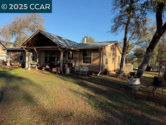 a view of swimming pool with outdoor seating