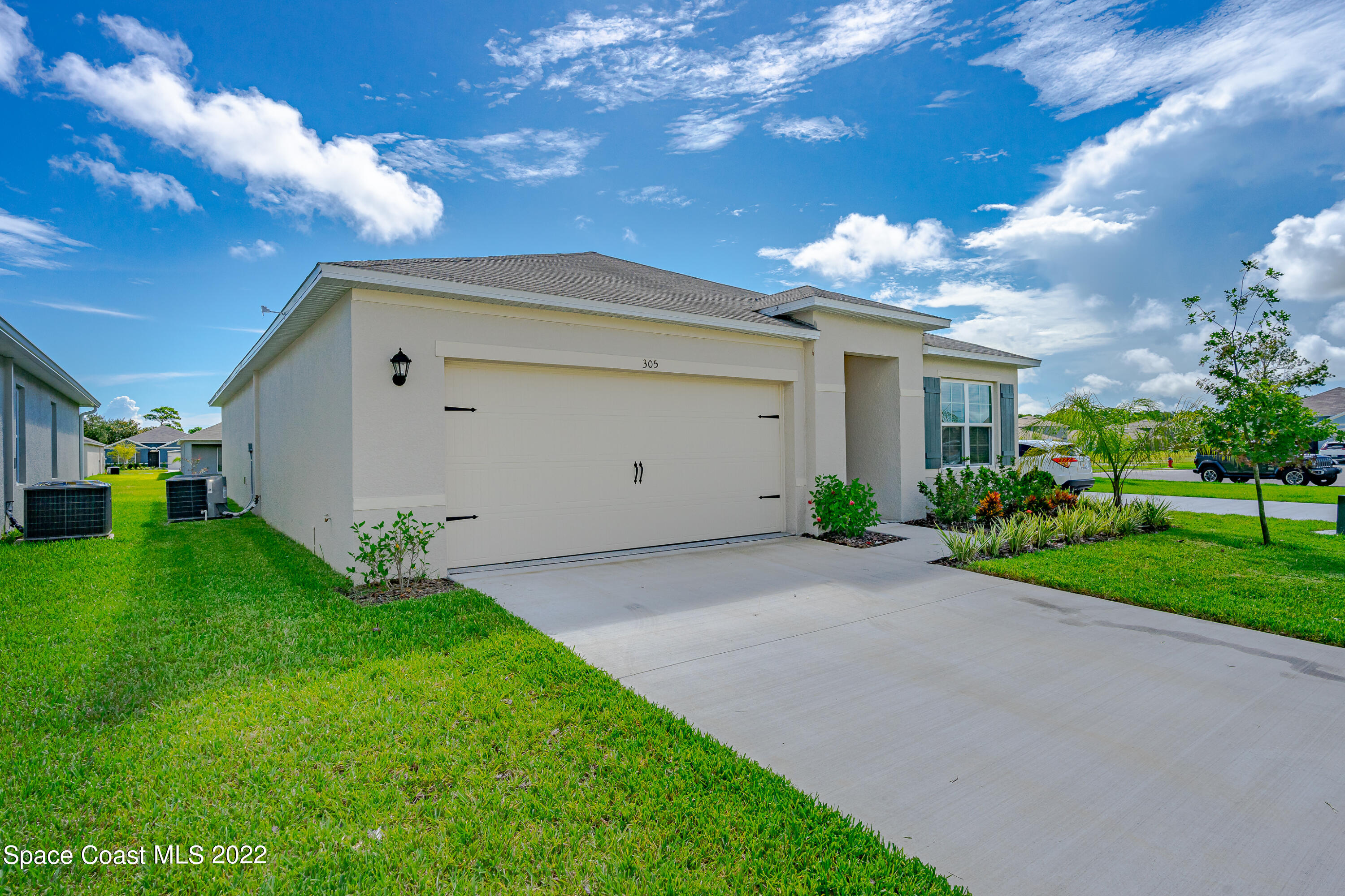 305 Sunset View Drive Edgewater, FL 32141 - Photo 2 of 37 a view of a house with a yard