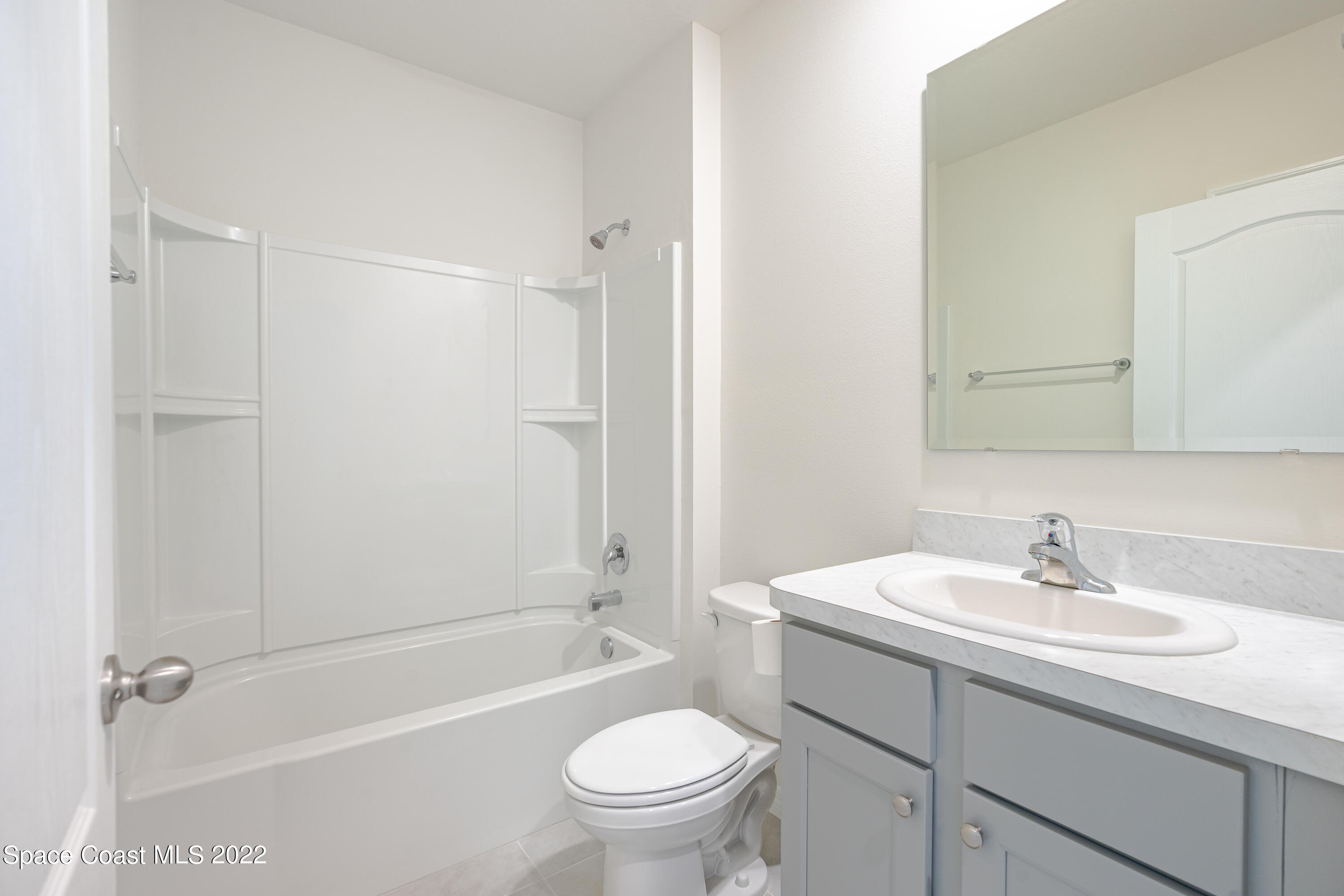 305 Sunset View Drive Edgewater, FL 32141 - Photo 27 of 37 a bathroom with a sink toilet and shower