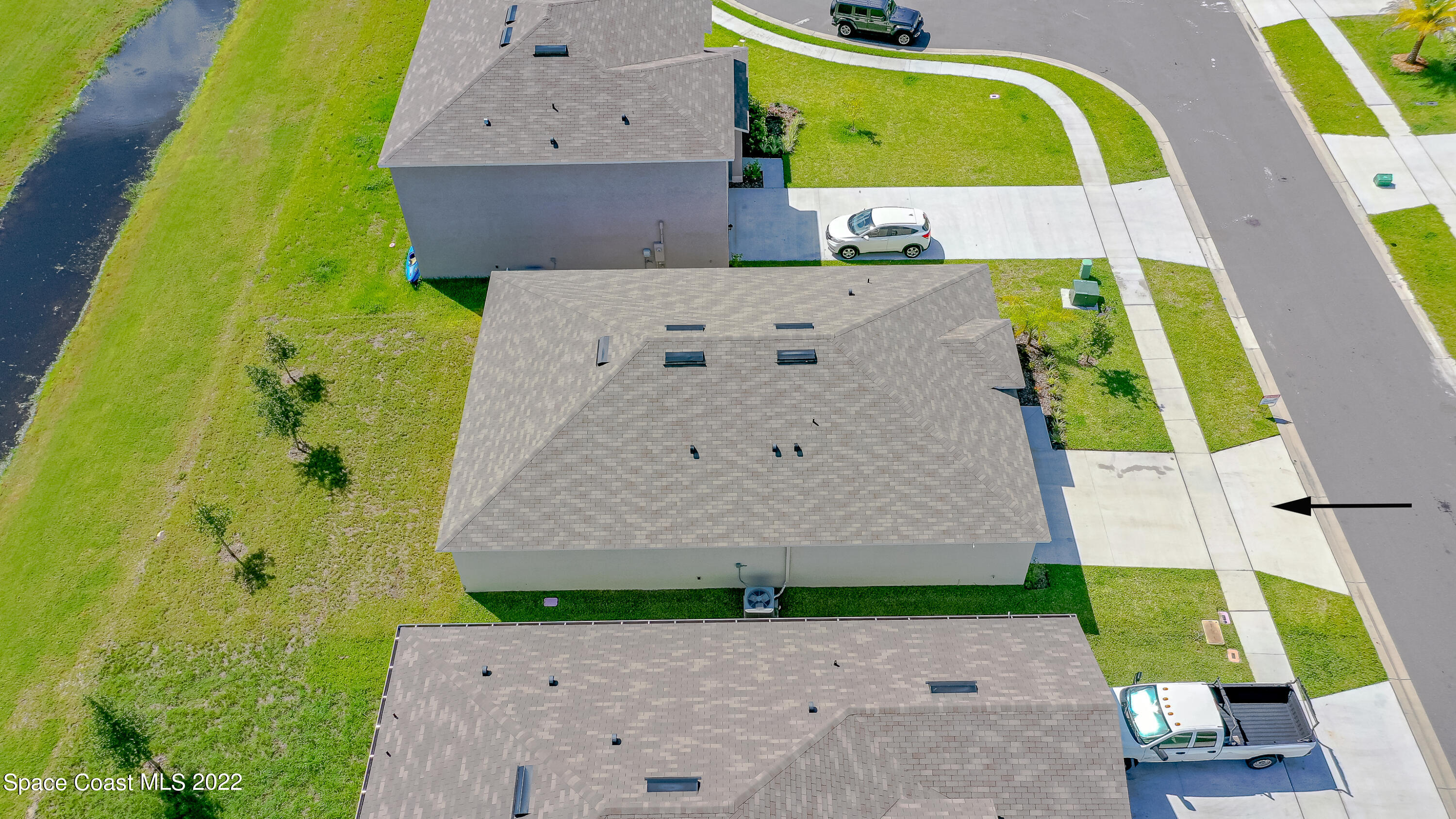 305 Sunset View Drive Edgewater, FL 32141 - Photo 33 of 37 an aerial view of a house with a swimming pool