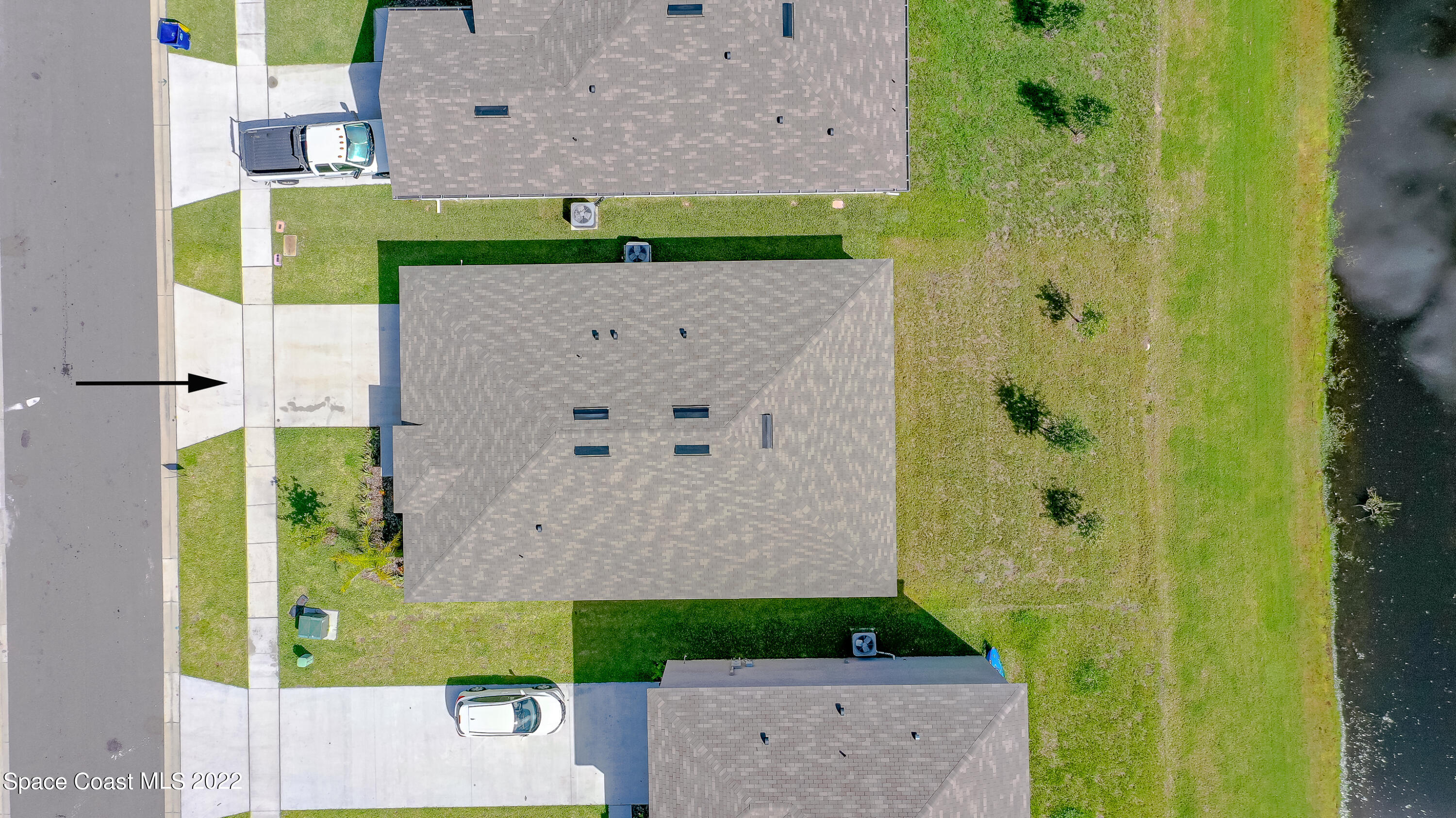 305 Sunset View Drive Edgewater, FL 32141 - Photo 35 of 37 an aerial view of a house with a yard