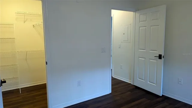 a view of small space with racks on the wall