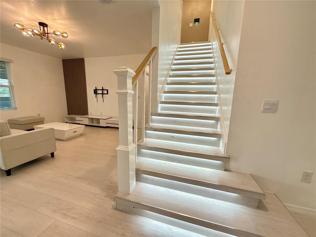 2731 House Finch Road Harmony, FL 34773 - Photo 26 of 57 a view of entryway and hall