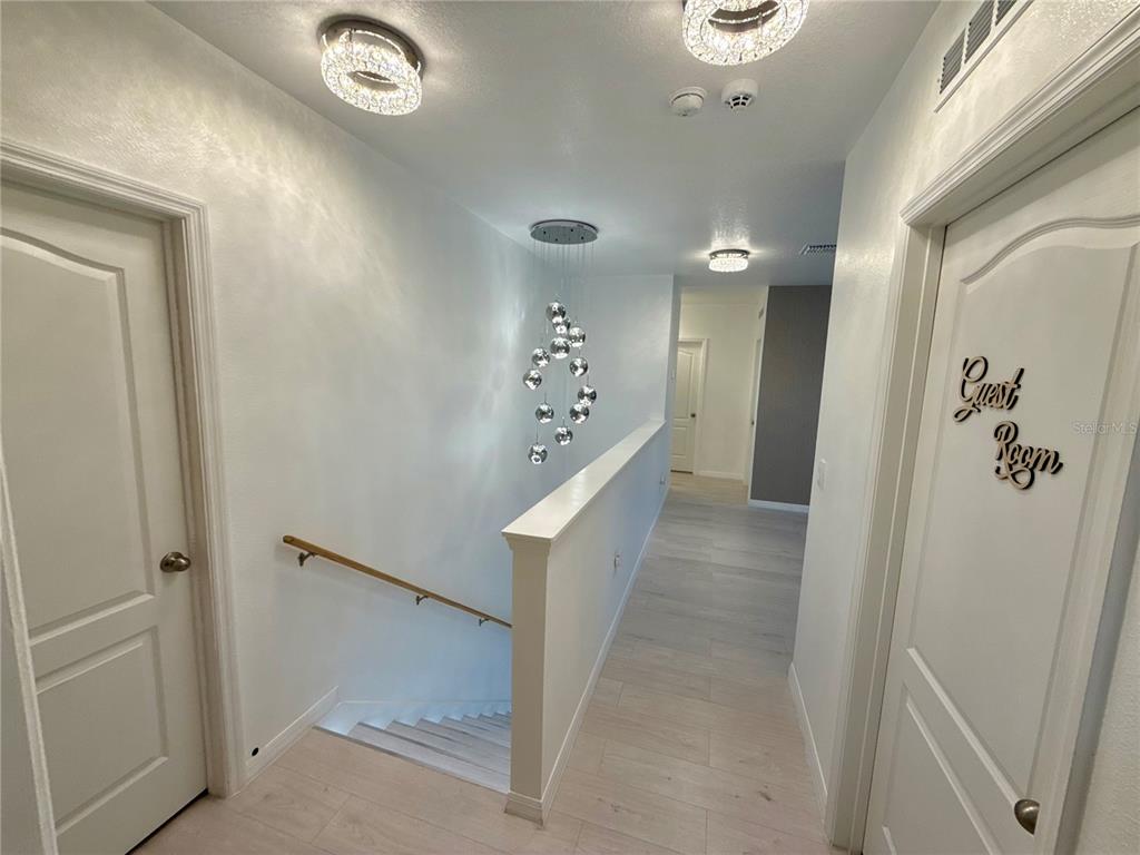 2731 House Finch Road Harmony, FL 34773 - Photo 30 of 57 a view of a hallway with entryway