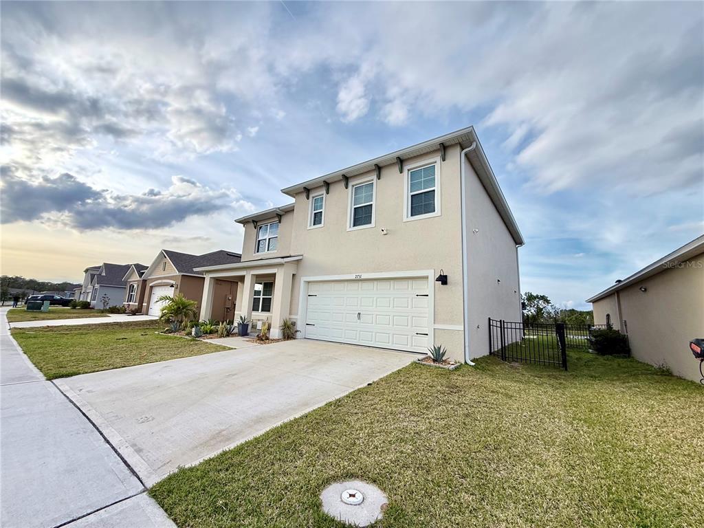 2731 House Finch Road Harmony, FL 34773 - Photo 4 of 57 a view of a house with backyard