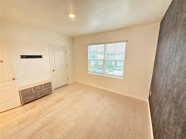 a view of a bench in the middle of a lake