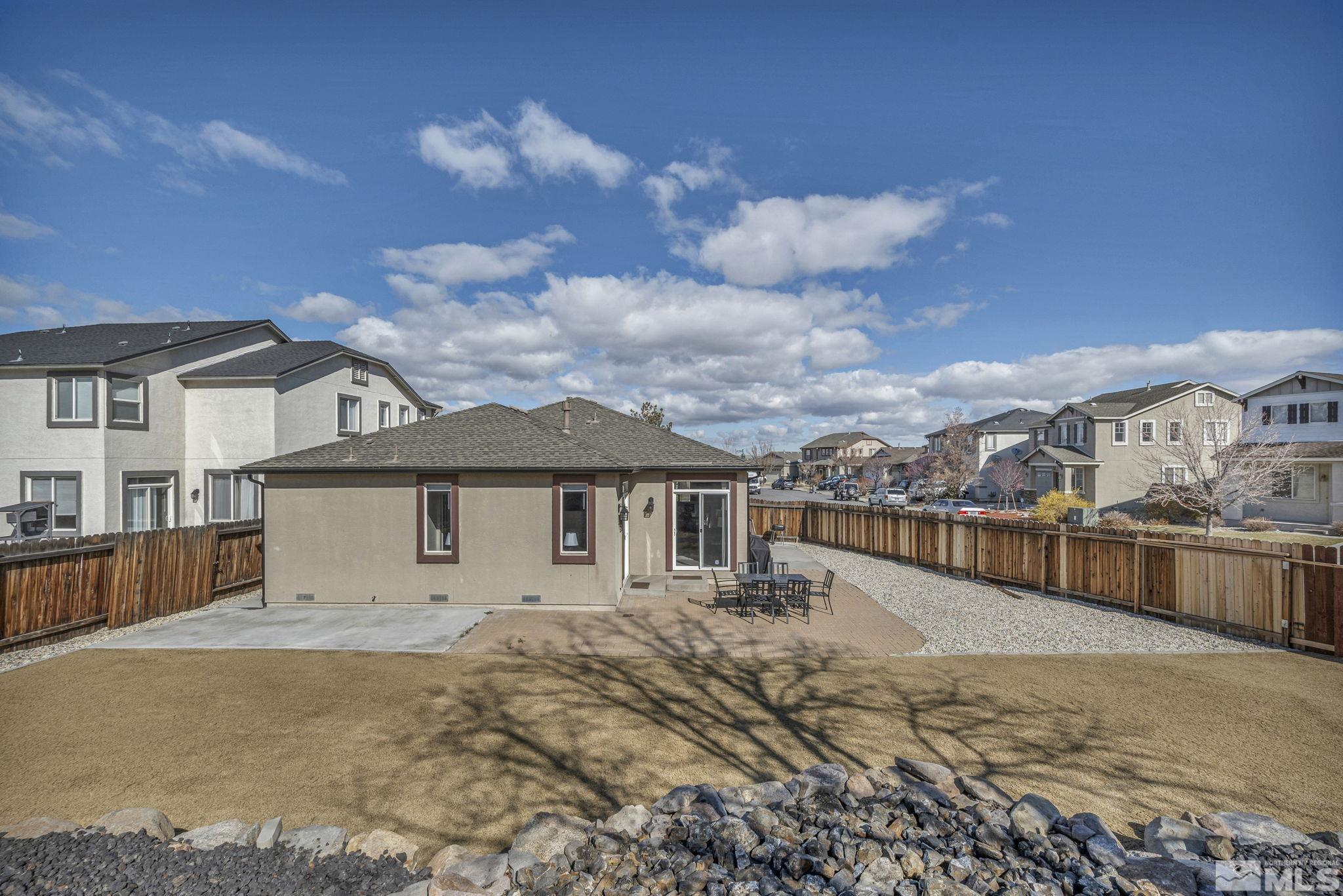 2296 Rio Lobo Lane Reno, NV 89521 - Photo 33 of 33 a view of a house with a yard