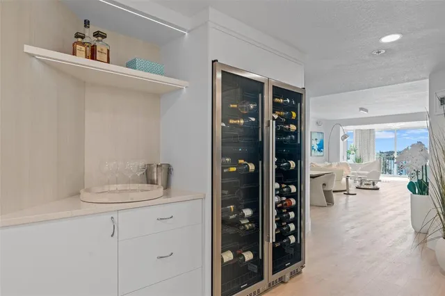 a en suite bathroom with a sink a mirror and shower