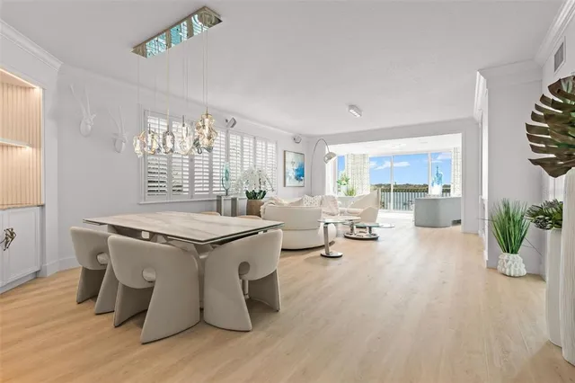 a kitchen with a stove a counter space and a window