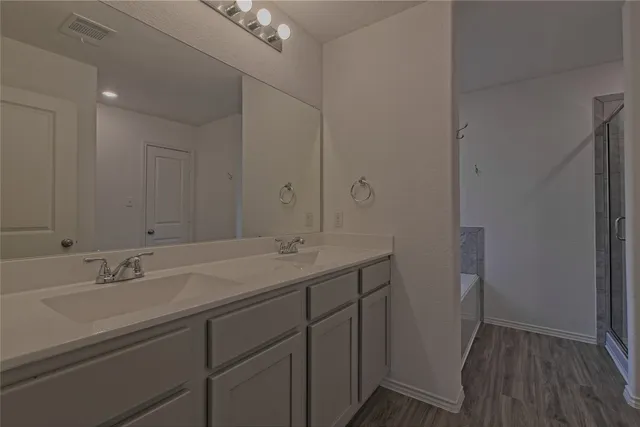 a view of a room with white walls