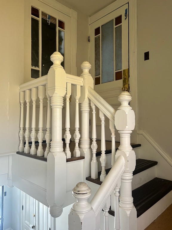 237 Branch Street Lowell, MA 01851 - Photo 15 of 15 a front view of a house with wooden floor