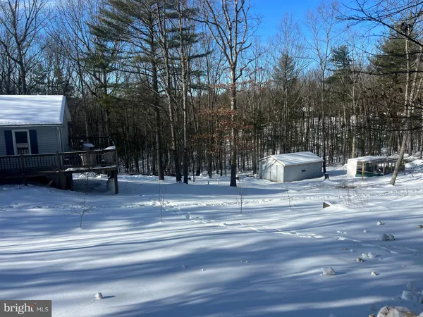 a view of a terrace with sitting area