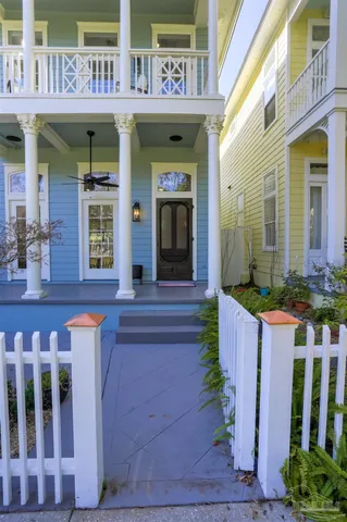 a view of a garden with an outdoor seating
