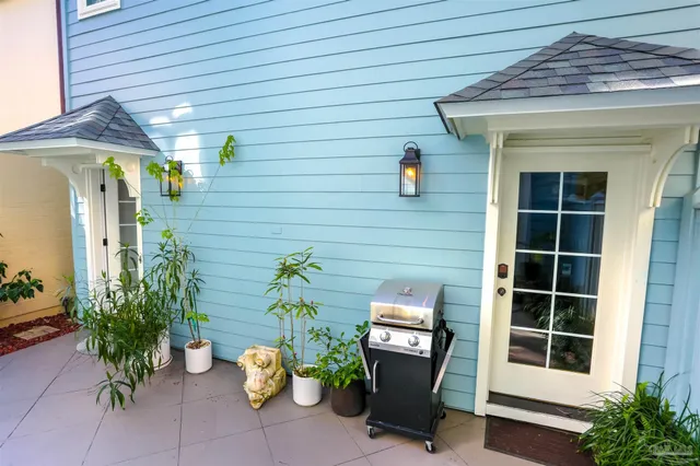 a view of balcony with wooden floor and fence