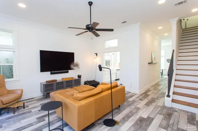 a kitchen with stainless steel appliances a sink stove and refrigerator