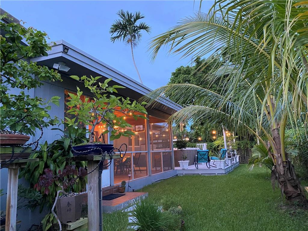 3464 Pierce Street Hollywood, FL 33021 - Photo 54 of 57 Garden view of the Lanai, yard and deck.