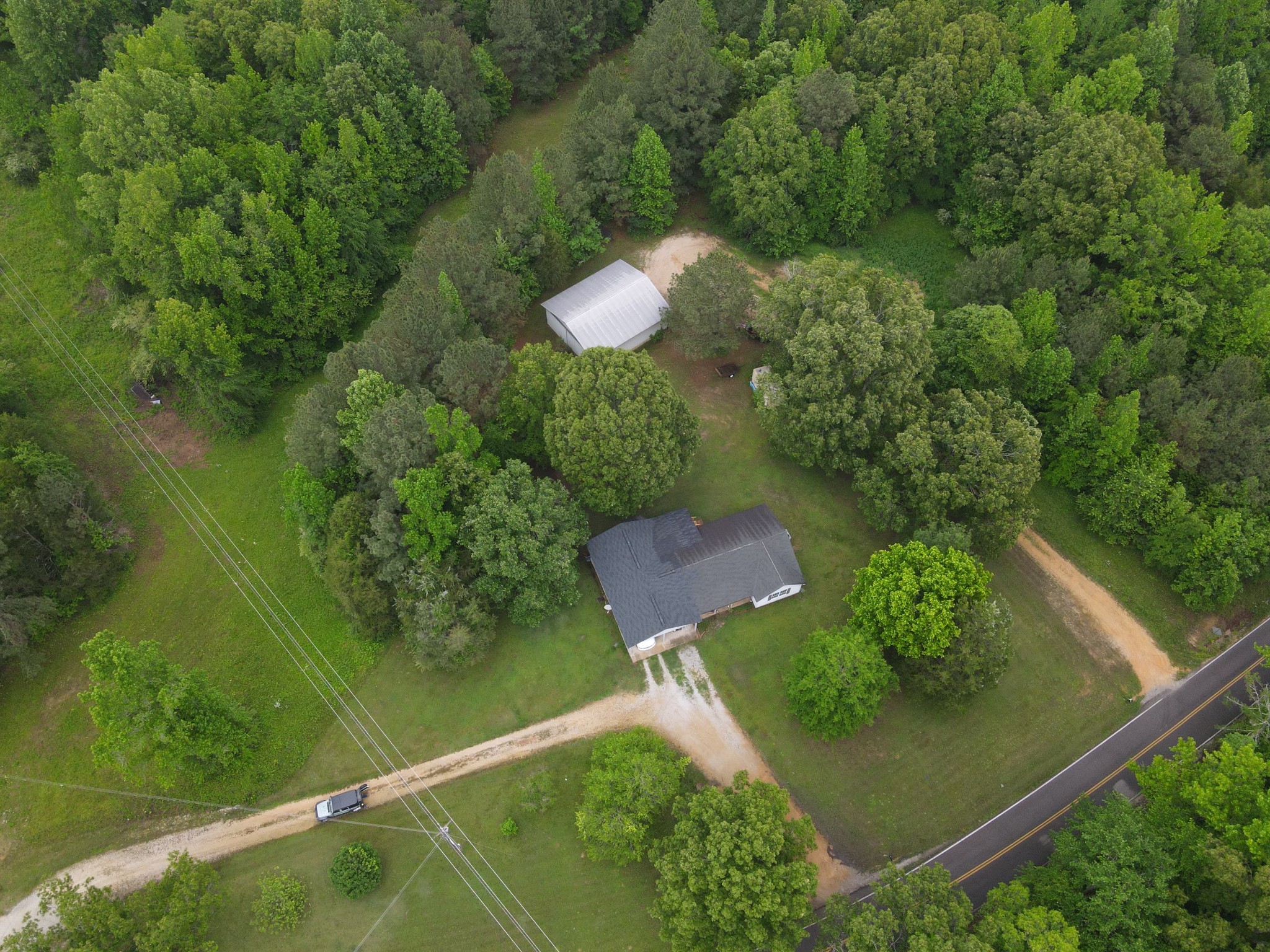 an aerial view of a house a yard