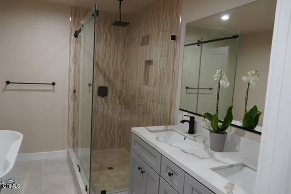 a bathroom with a white bath tub