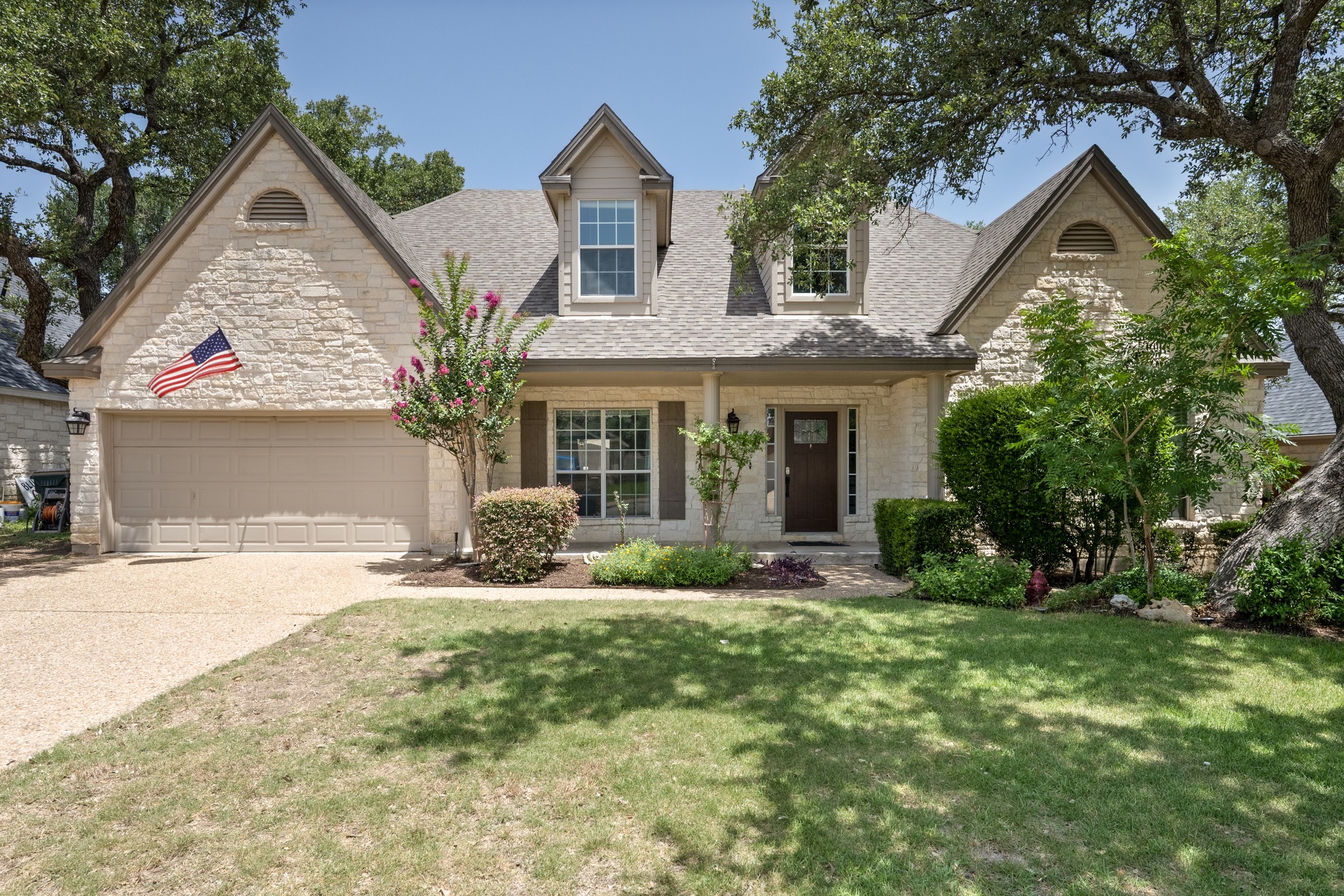 108 Thornwood Road Georgetown, TX 78628 - Photo 1 of 40 A classic facade of stone and siding greets with inviting landscaping and mature shade trees.