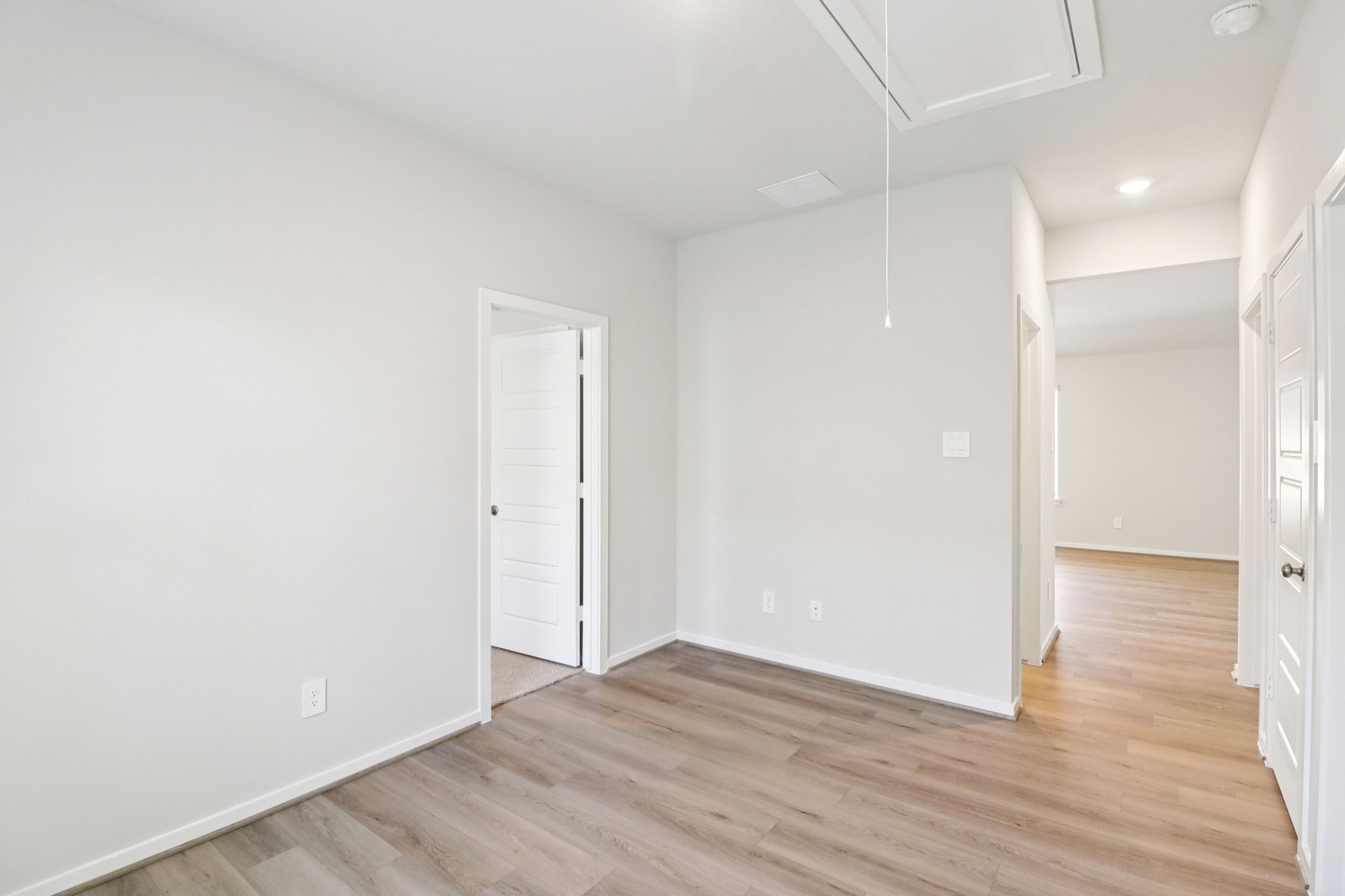 16273 Parish Pointe Court Conroe, TX 77302 - Photo 17 of 29 a view of hallway with wooden floor