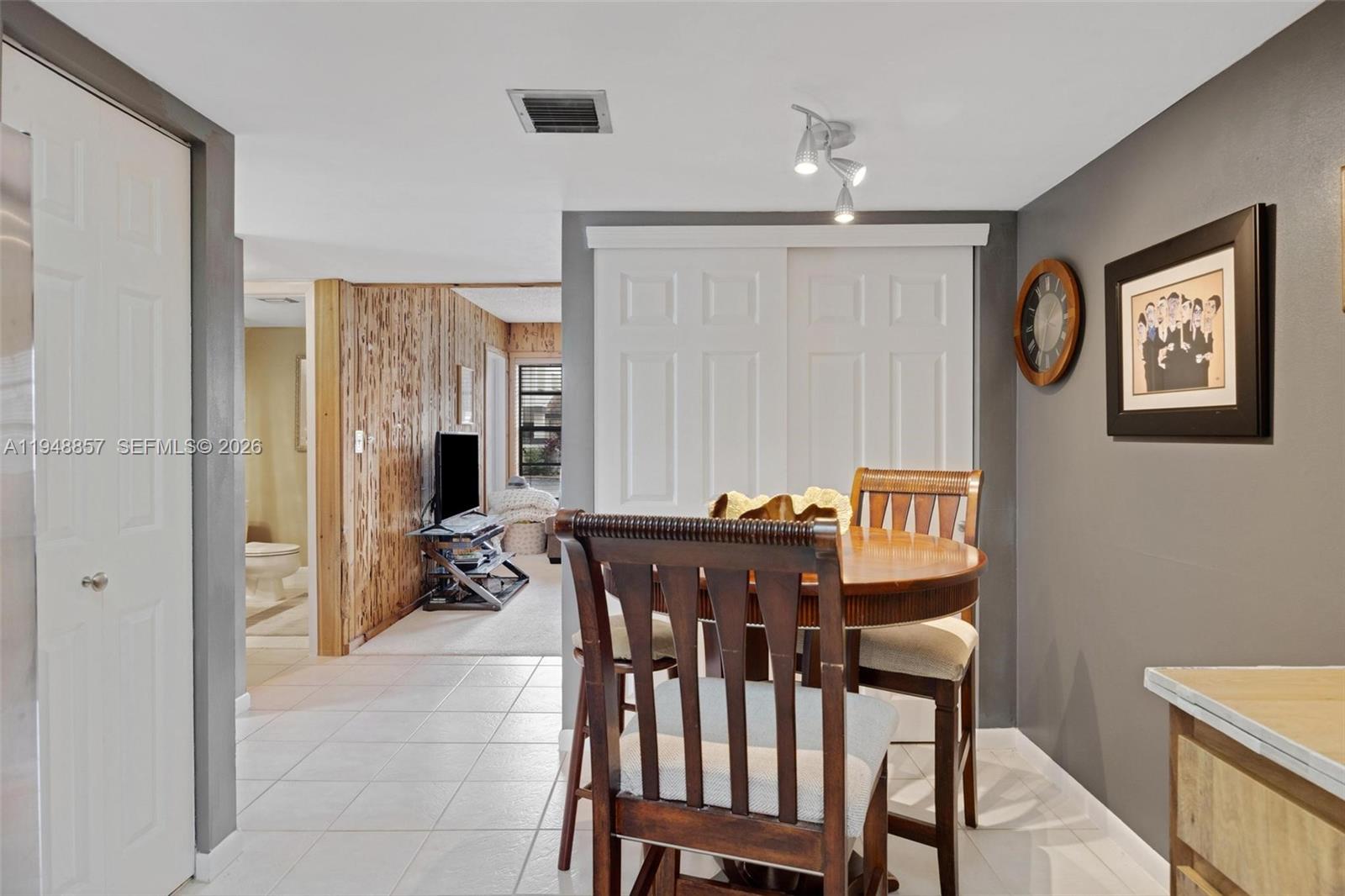 11769 Southwest 91st Terrace Miami, FL 33186 - Photo 13 of 33 a view of a dining room with furniture