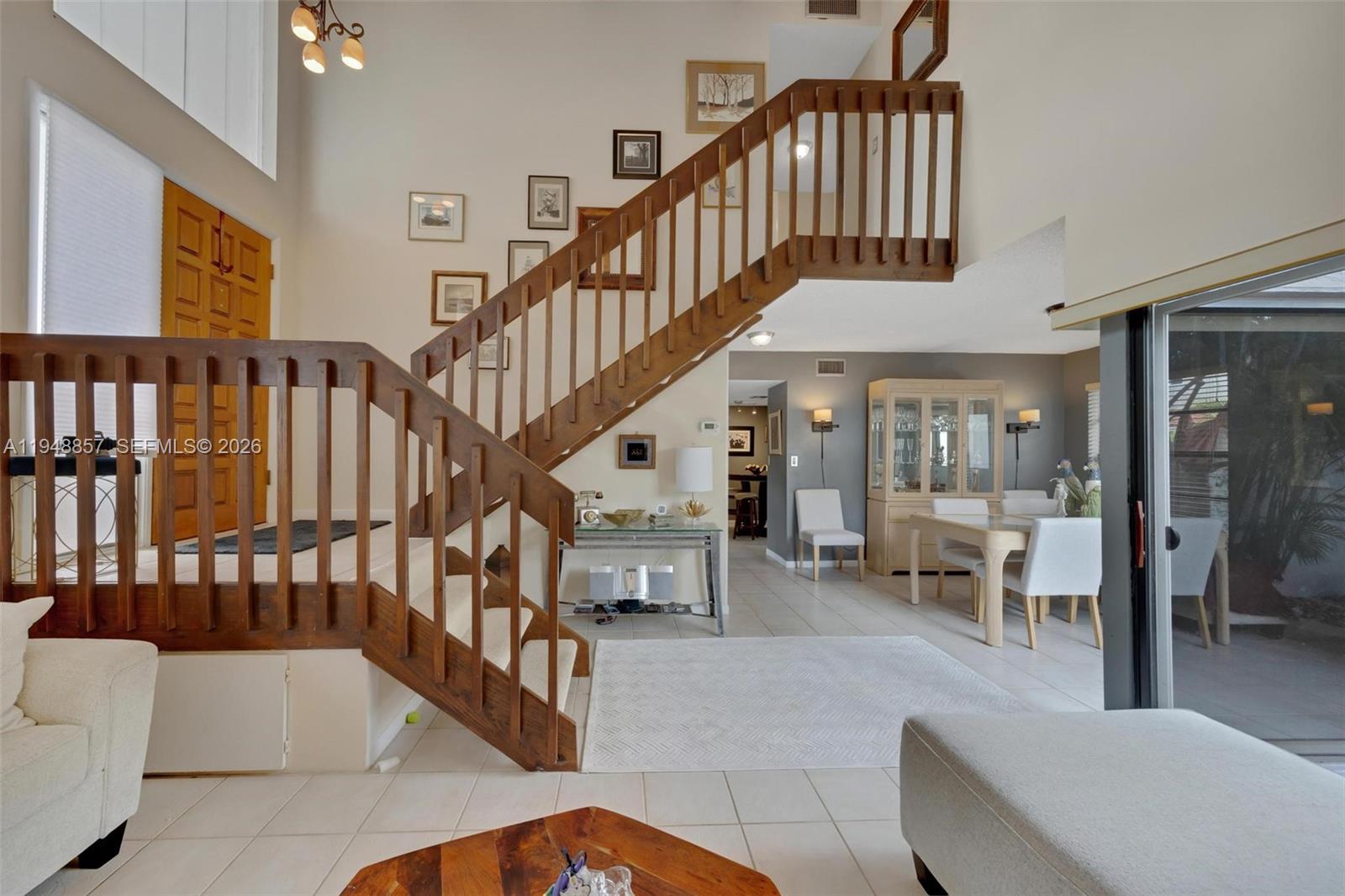 11769 Southwest 91st Terrace Miami, FL 33186 - Photo 14 of 33 a view of entryway livingroom and hall with wooden floor