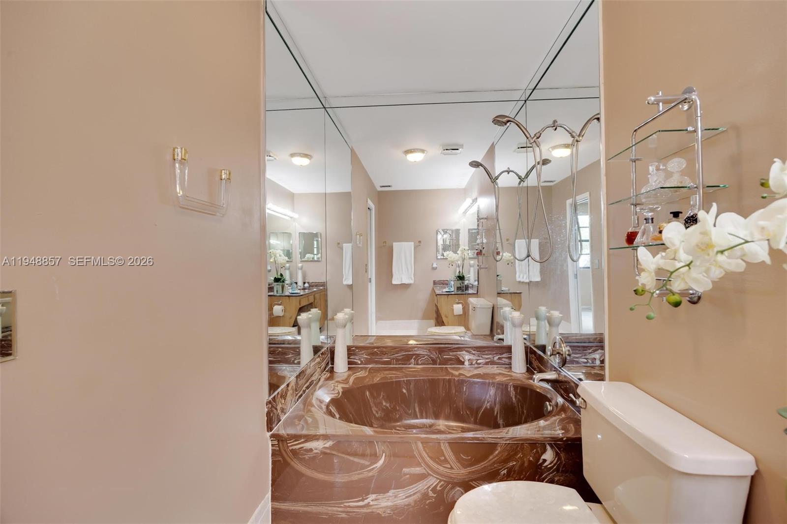 11769 Southwest 91st Terrace Miami, FL 33186 - Photo 18 of 33 a living room with couches and kitchen view with wooden floor