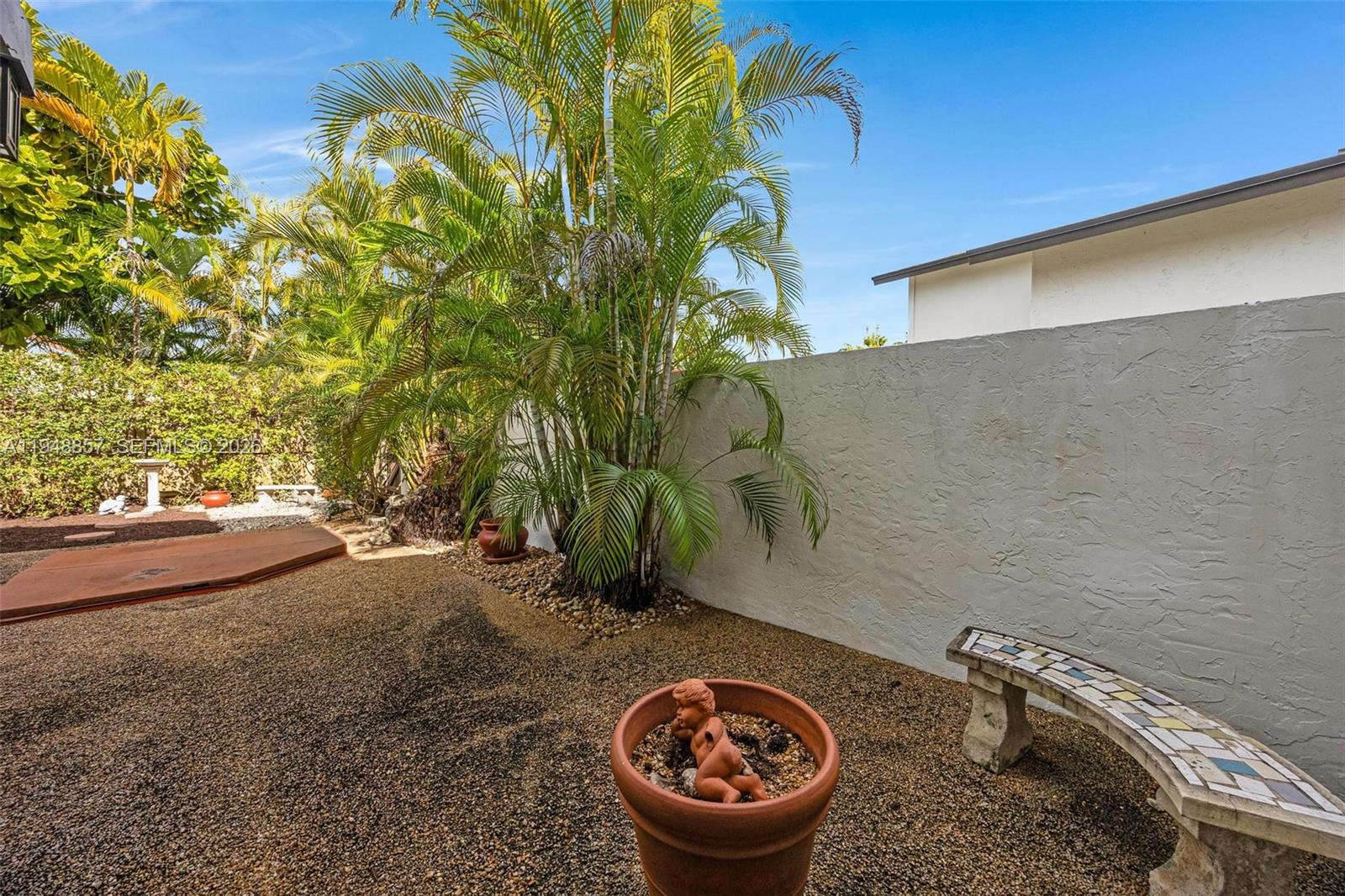 11769 Southwest 91st Terrace Miami, FL 33186 - Photo 27 of 33 a view of a backyard of a house