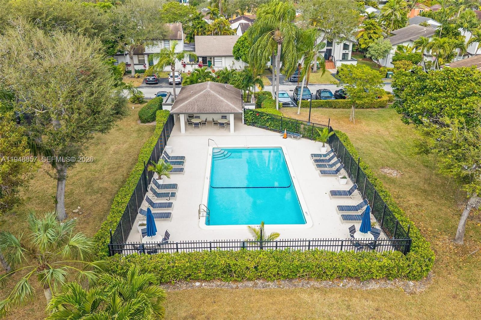 11769 Southwest 91st Terrace Miami, FL 33186 - Photo 30 of 33 a aerial view of a house with a yard and lake view