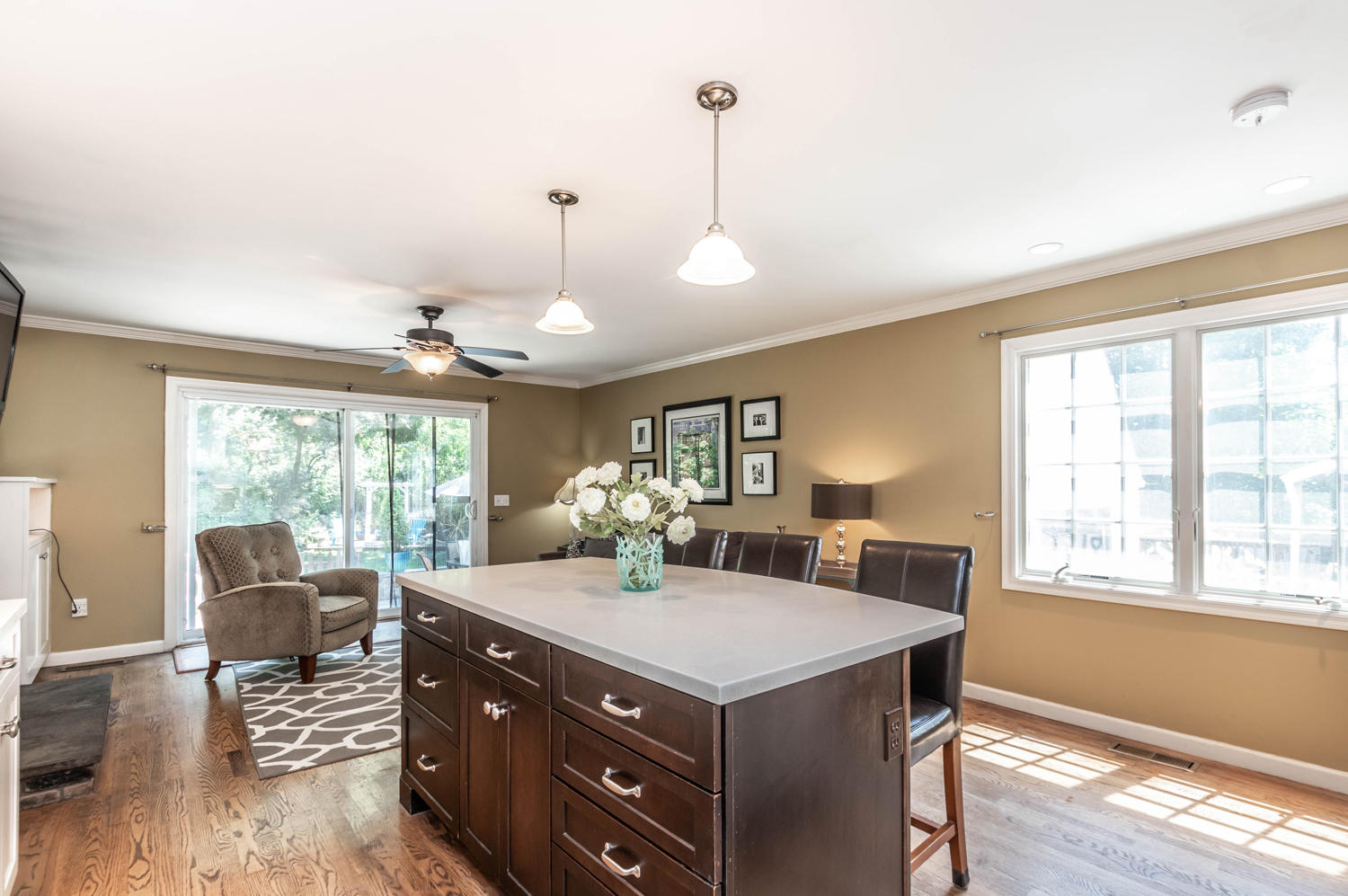 4 Moore Street Darien, CT 06820 - Photo 11 of 30 a view of a dining room with furniture a chandelier and wooden floor