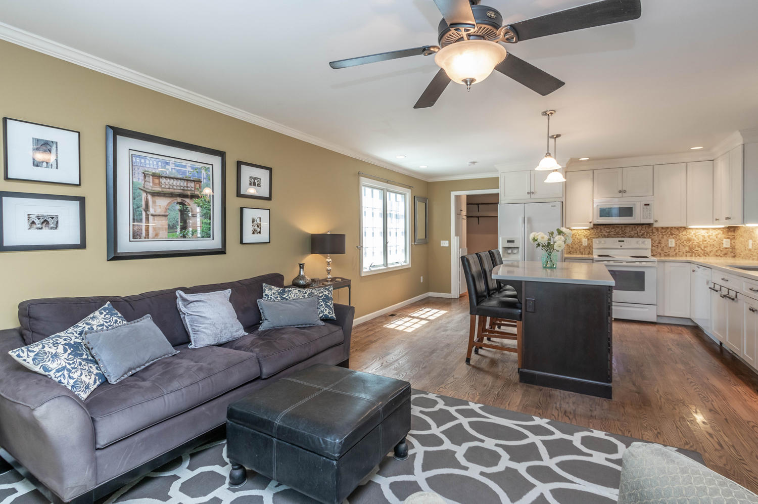 4 Moore Street Darien, CT 06820 - Photo 12 of 30 a living room with furniture and a large window