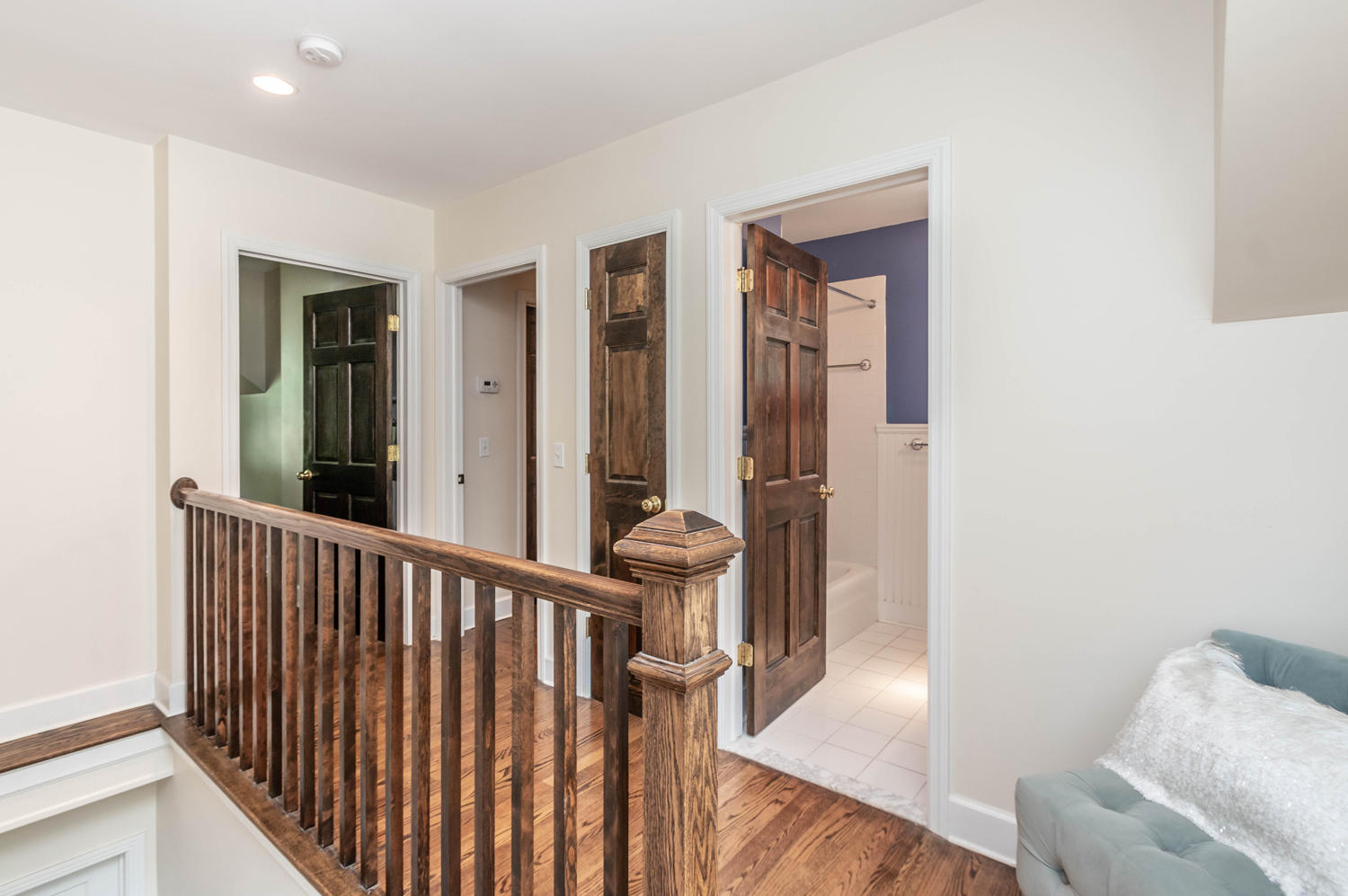 4 Moore Street Darien, CT 06820 - Photo 16 of 30 a view of a hallway with furniture and windows
