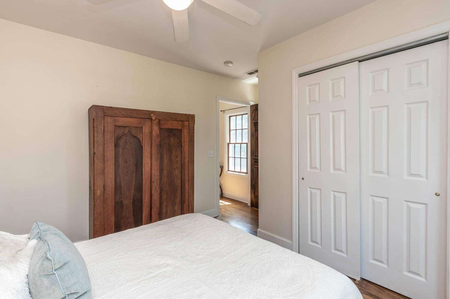 4 Moore Street Darien, CT 06820 - Photo 21 of 30 a bedroom with a bed and a window