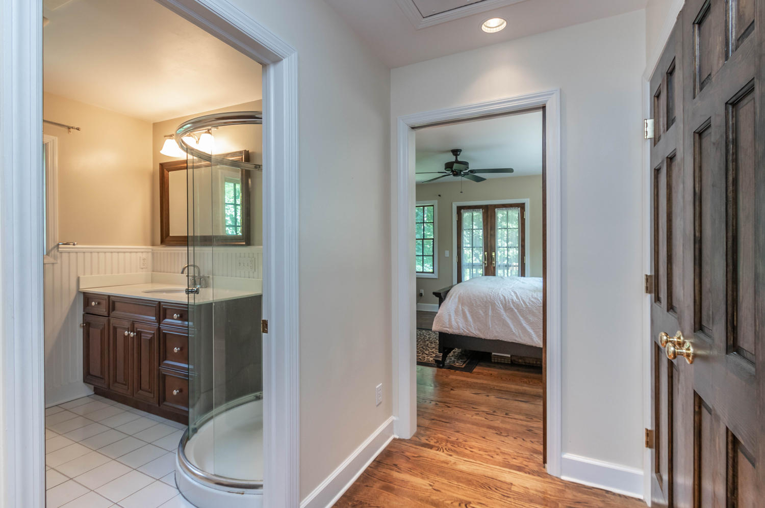 4 Moore Street Darien, CT 06820 - Photo 22 of 30 a en suite bathroom with a granite countertop sink and a mirror