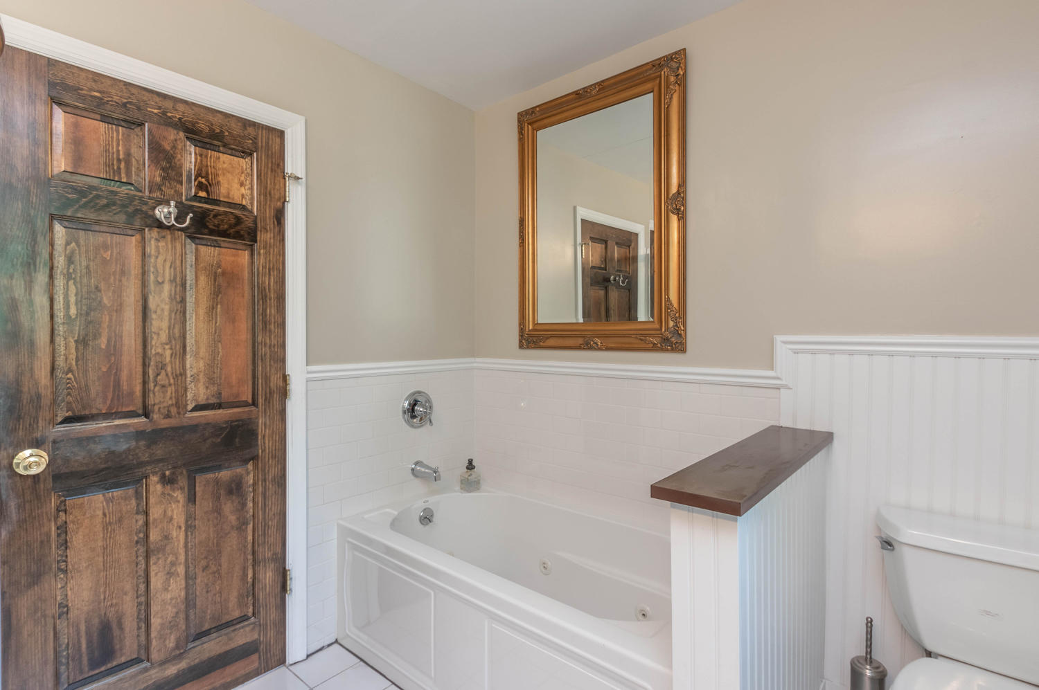 4 Moore Street Darien, CT 06820 - Photo 24 of 30 a bathroom with a bathtub and a shower