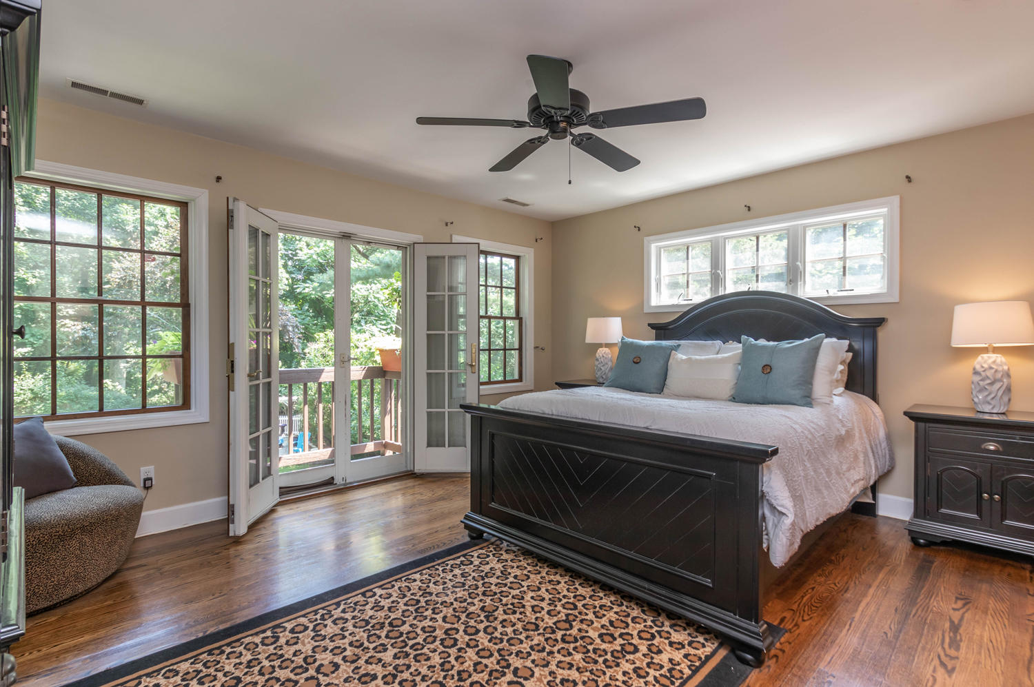 4 Moore Street Darien, CT 06820 - Photo 25 of 30 a bedroom with a bed wooden floor and window