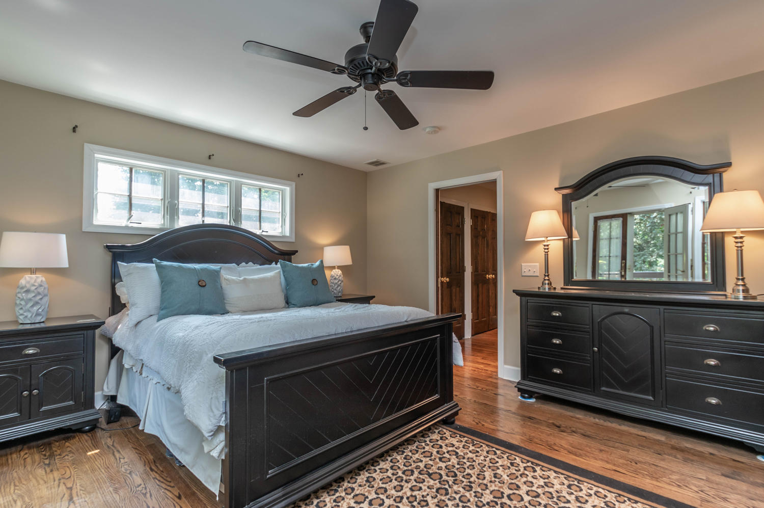 4 Moore Street Darien, CT 06820 - Photo 26 of 30 a bedroom with a bed and a dresser