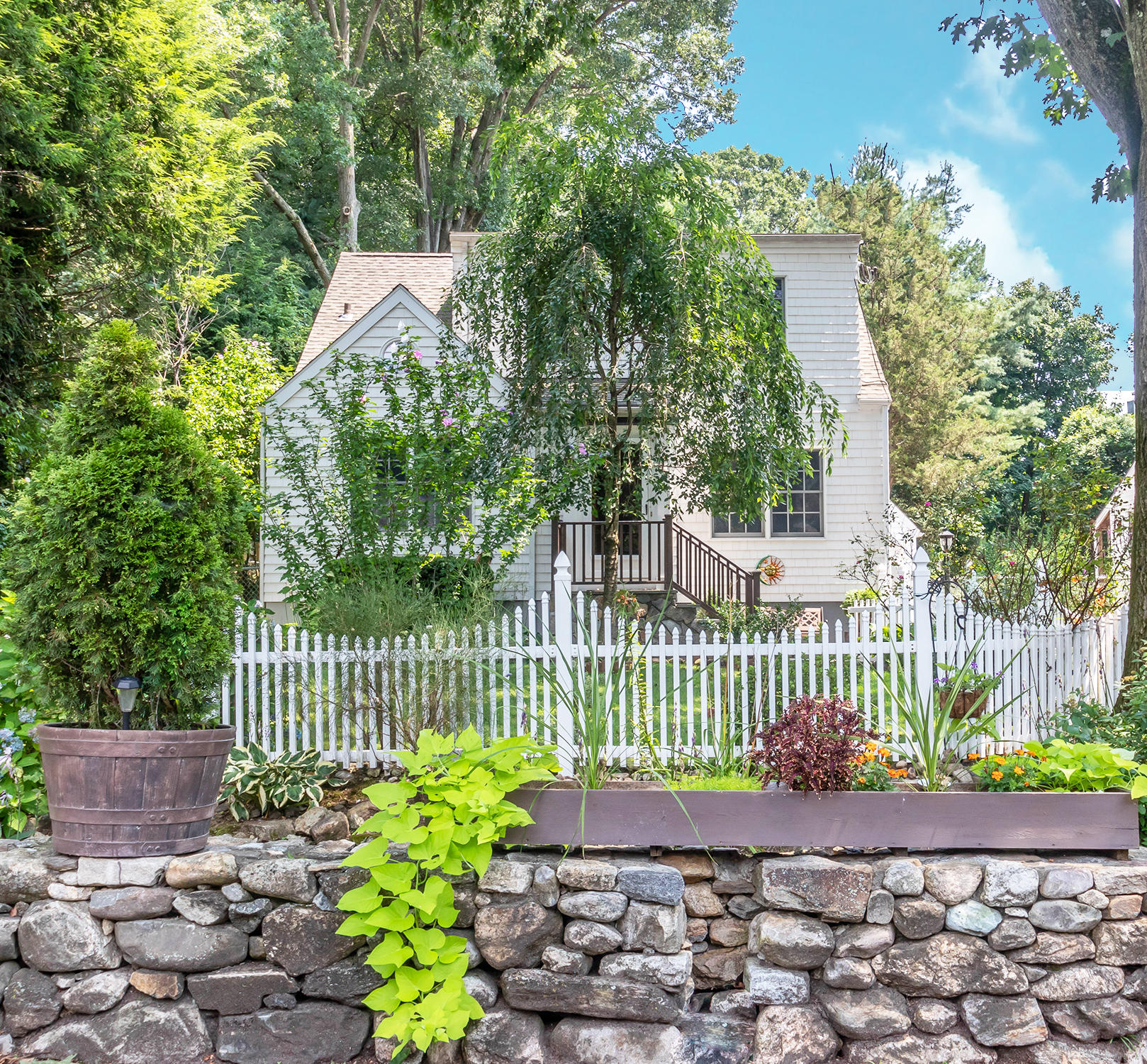 4 Moore Street Darien, CT 06820 - Photo 30 of 30 a street view with a garden