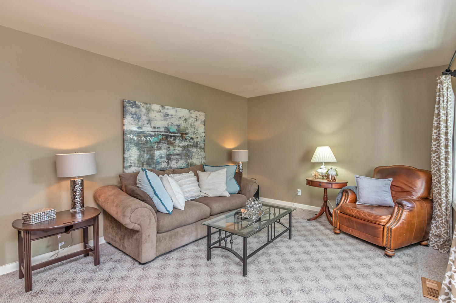 4 Moore Street Darien, CT 06820 - Photo 3 of 30 a living room with furniture and a lamp