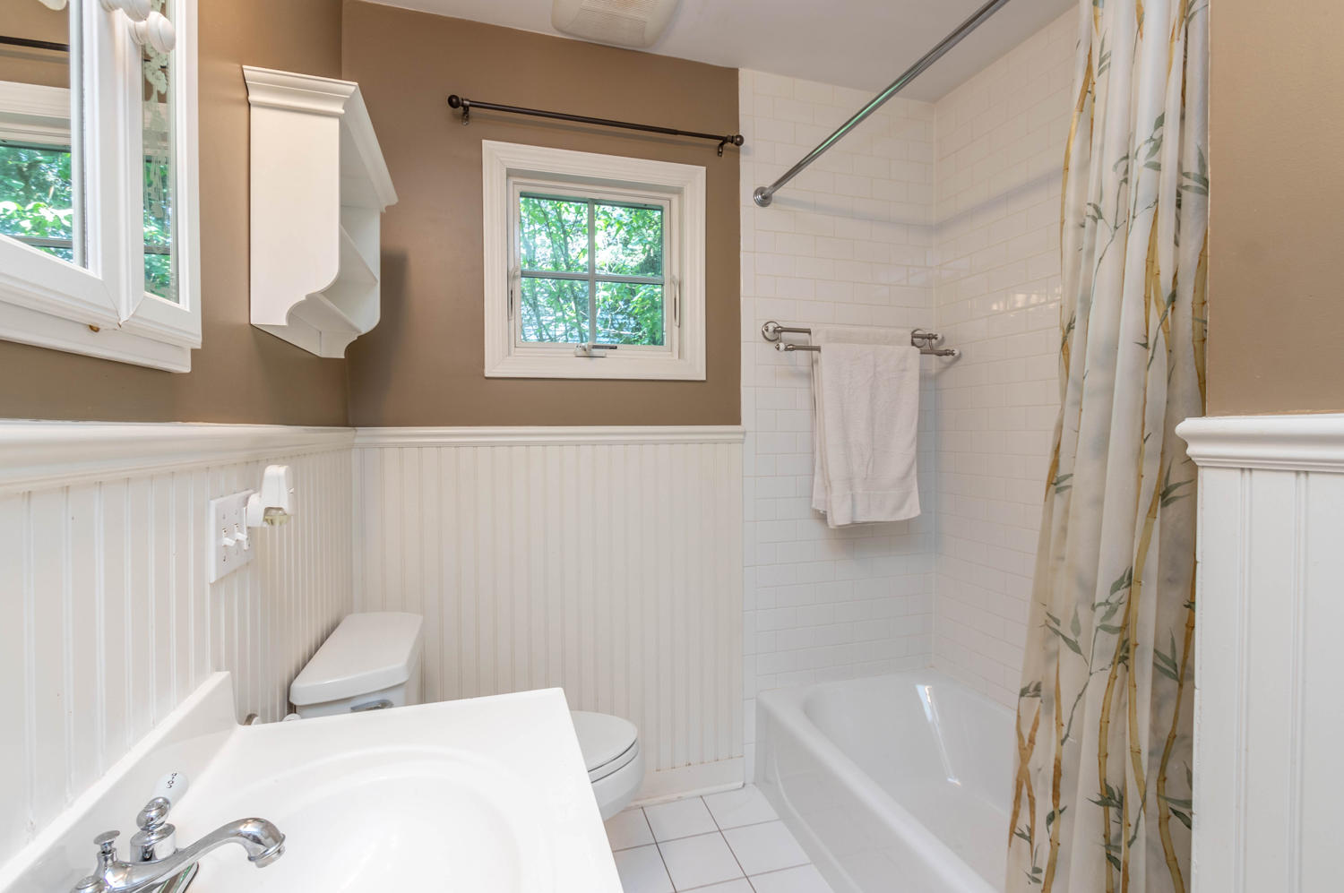 4 Moore Street Darien, CT 06820 - Photo 7 of 30 a bathroom with a sink a toilet and shower