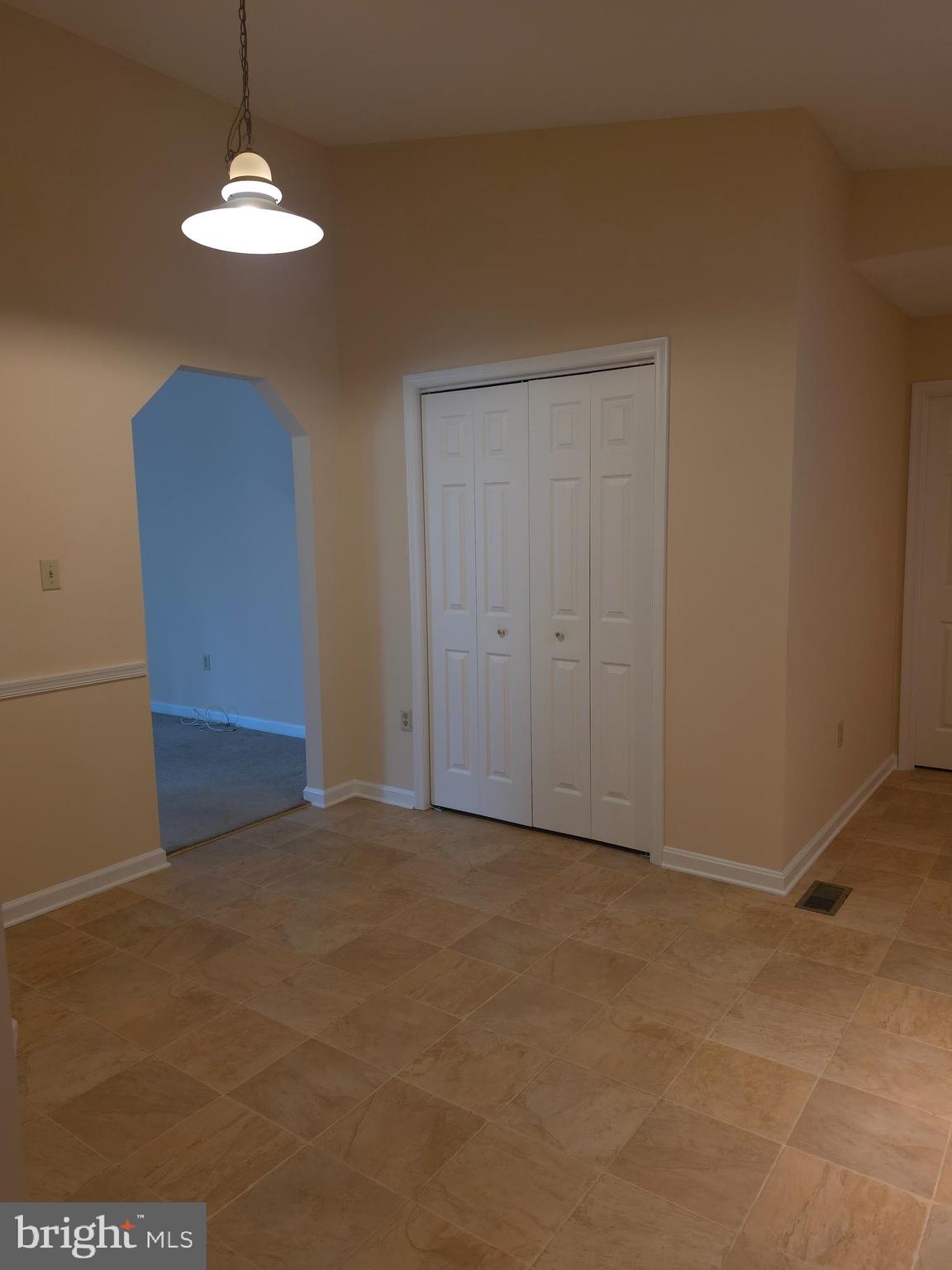 142 Braddock Boulevard Inwood, WV 25428 - Photo 12 of 36 a view of an empty room and a window