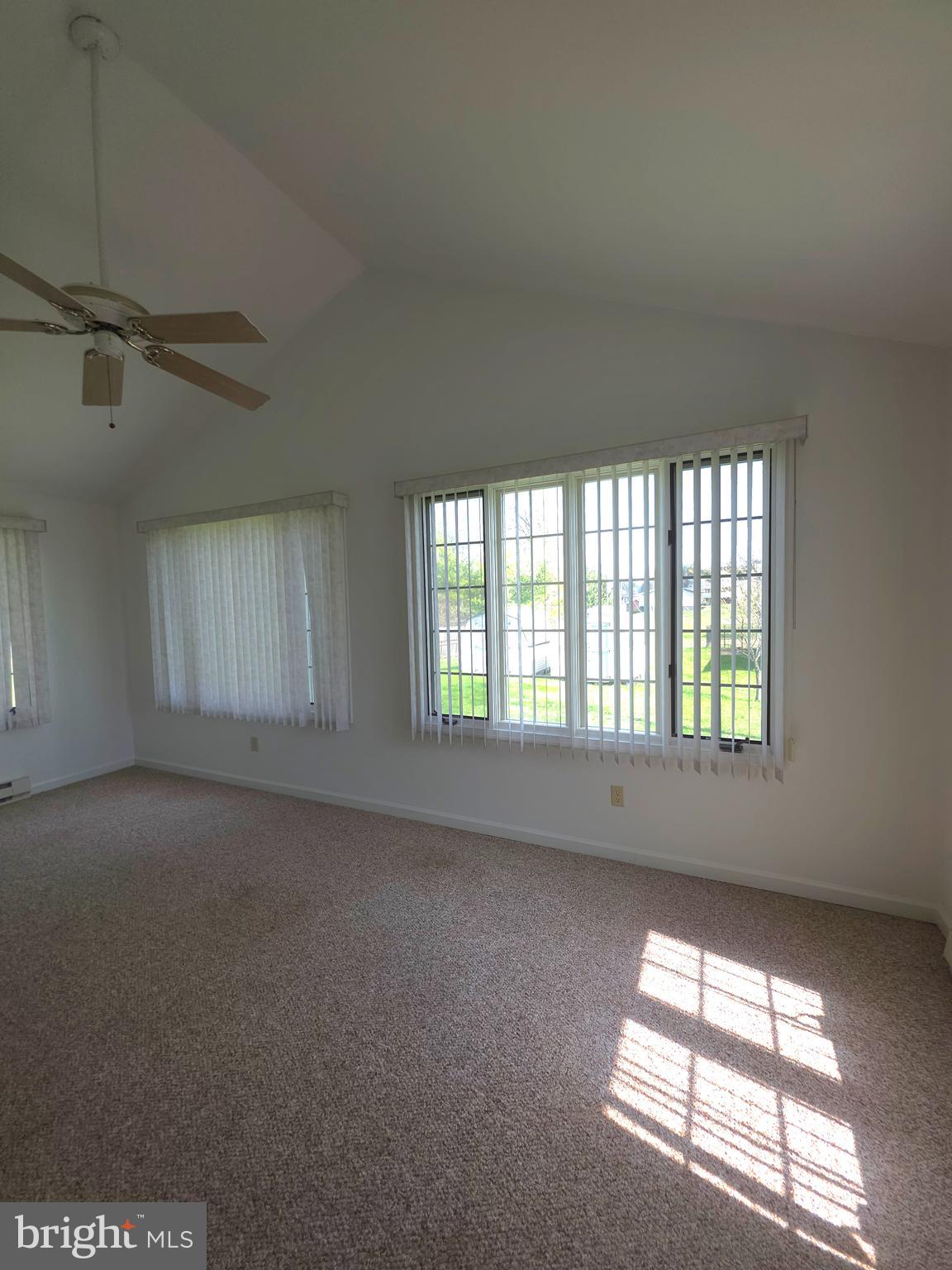 142 Braddock Boulevard Inwood, WV 25428 - Photo 16 of 36 an empty room with windows