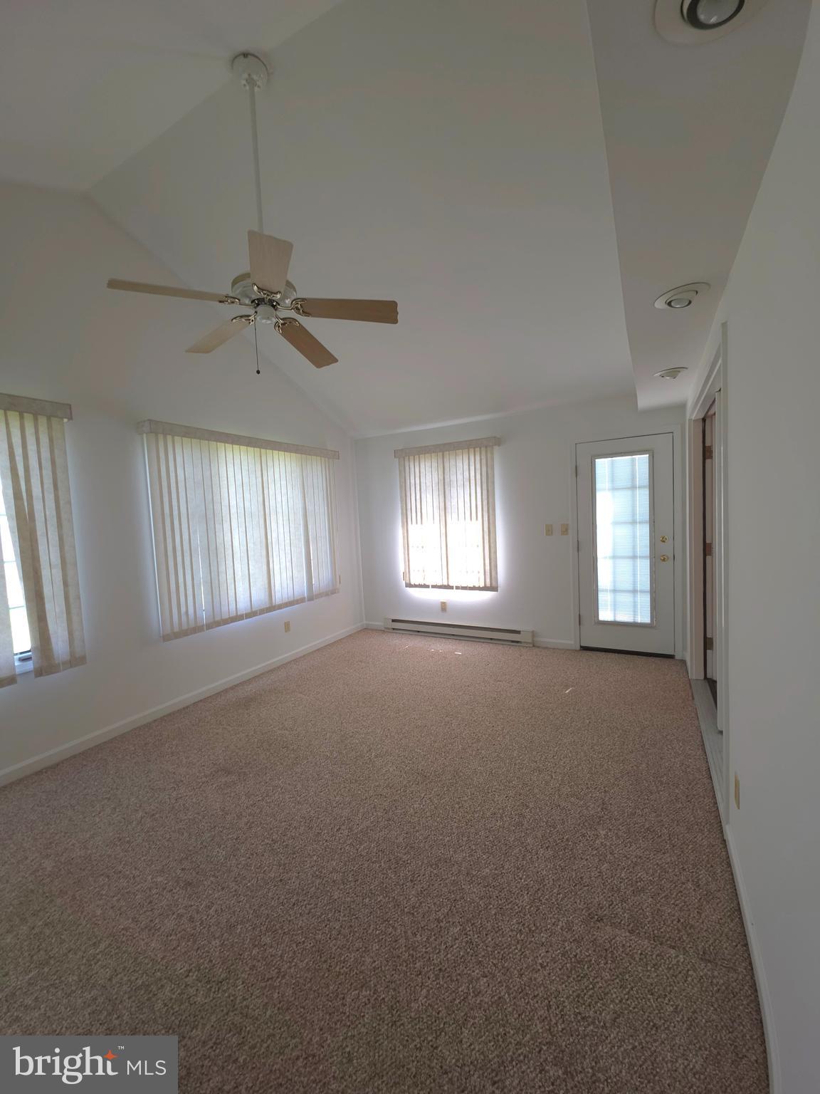 142 Braddock Boulevard Inwood, WV 25428 - Photo 19 of 36 a view of an empty room with a window