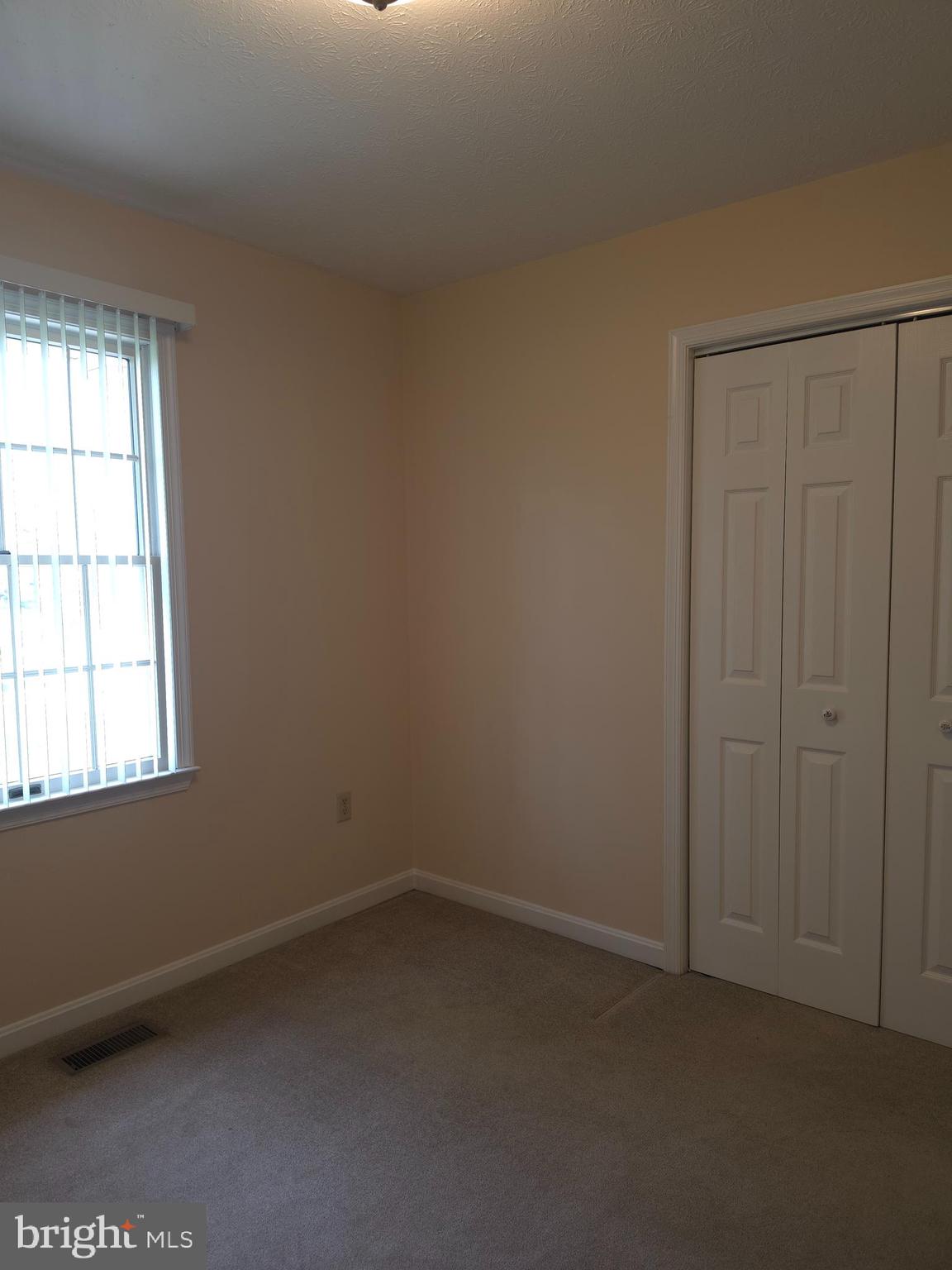 142 Braddock Boulevard Inwood, WV 25428 - Photo 27 of 36 an empty room with a window