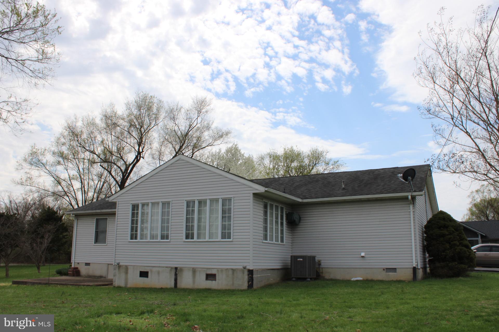 142 Braddock Boulevard Inwood, WV 25428 - Photo 31 of 36 front view of house with a yard
